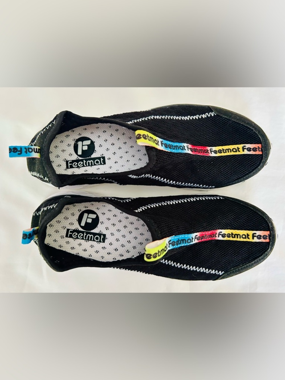 Women's Black Slip-On Water Shoes with Rainbow Accent